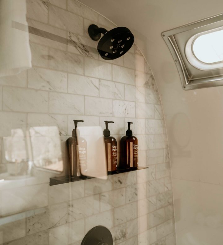 Classic Airstream Suite bathroom shower area with Ursa Major bath products