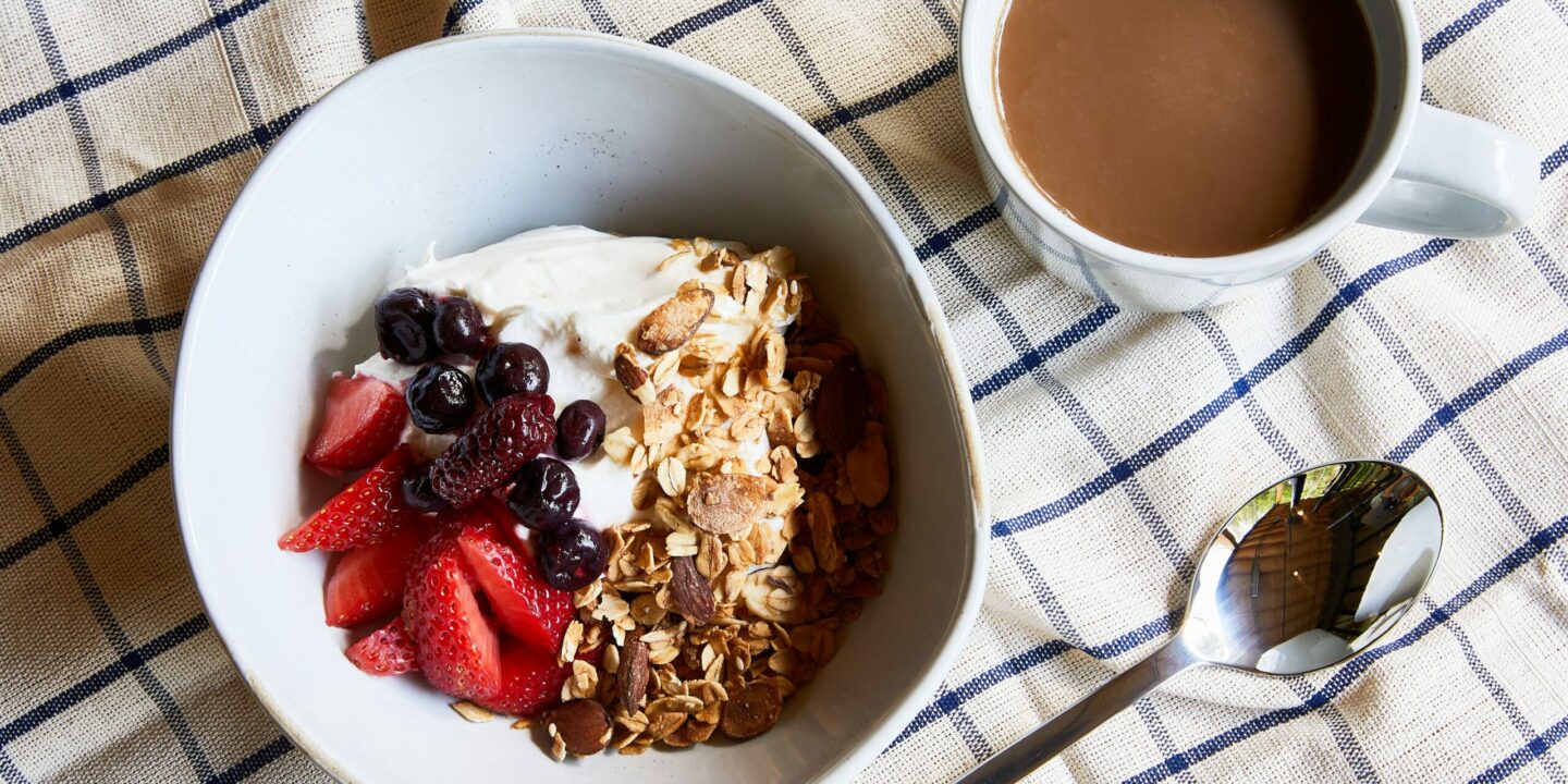 Yogurt, granola and fruit. Example of breakfast available at AutoCamp Catskills