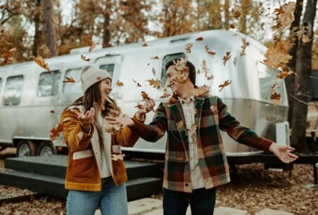 Couple-Throwing-Fall-Leaves