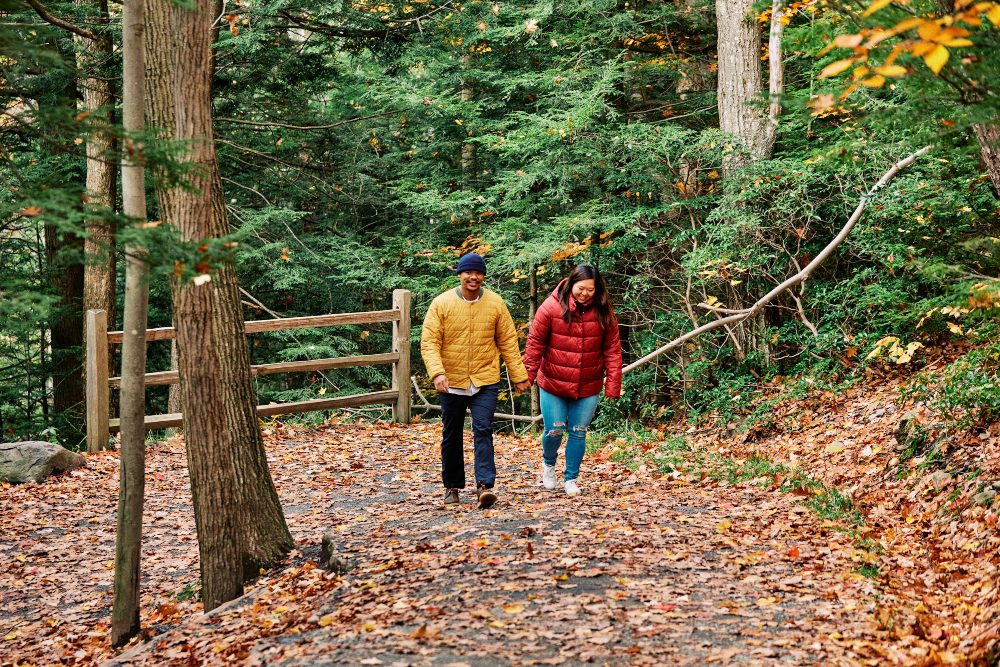 Couple-Hiking-Trail-in-Fall