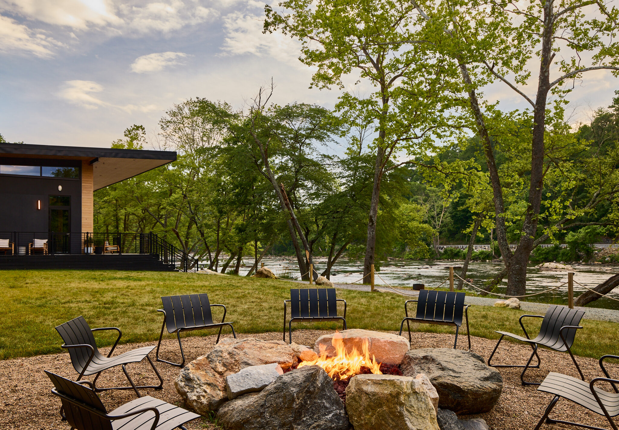 AutoCamp Asheville outdoor clubhouse firepit by the french broad river