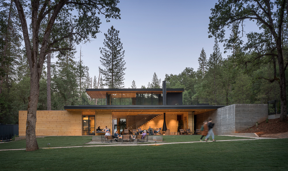 AutoCamp Yosemite clubhouse at dusk