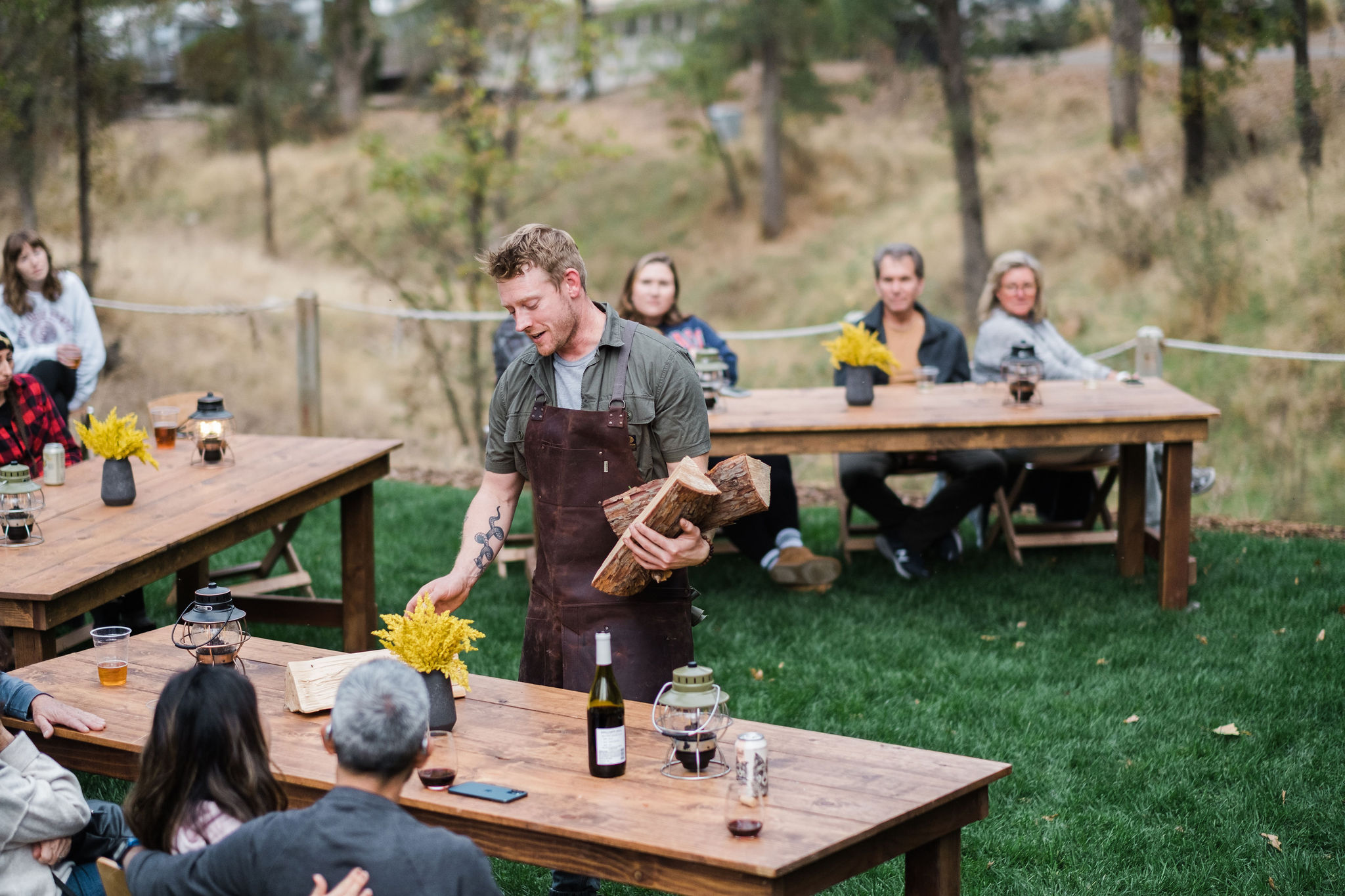 ACY - Guy preparing wood for outdoor venue space