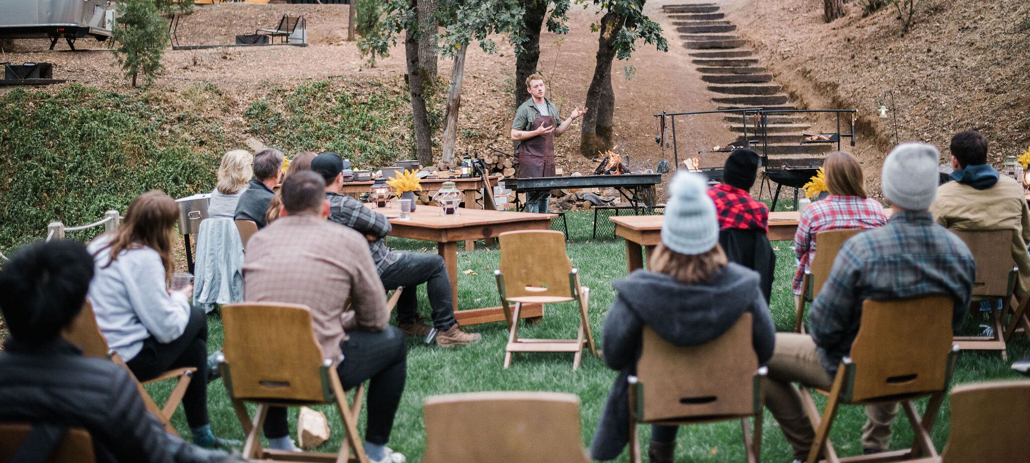 ACY - People attending outdoor team building meeting