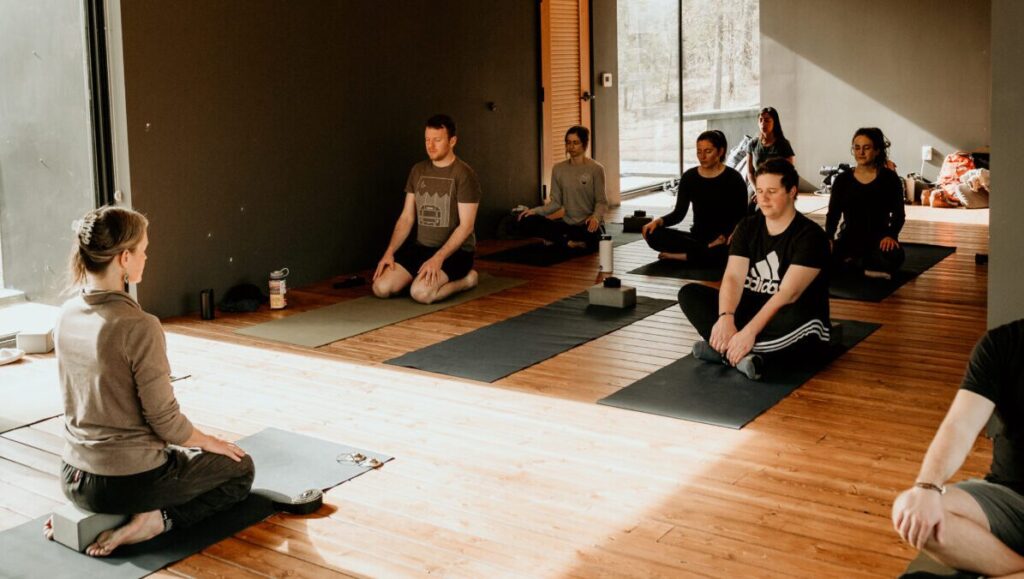 Group of people doing yoga