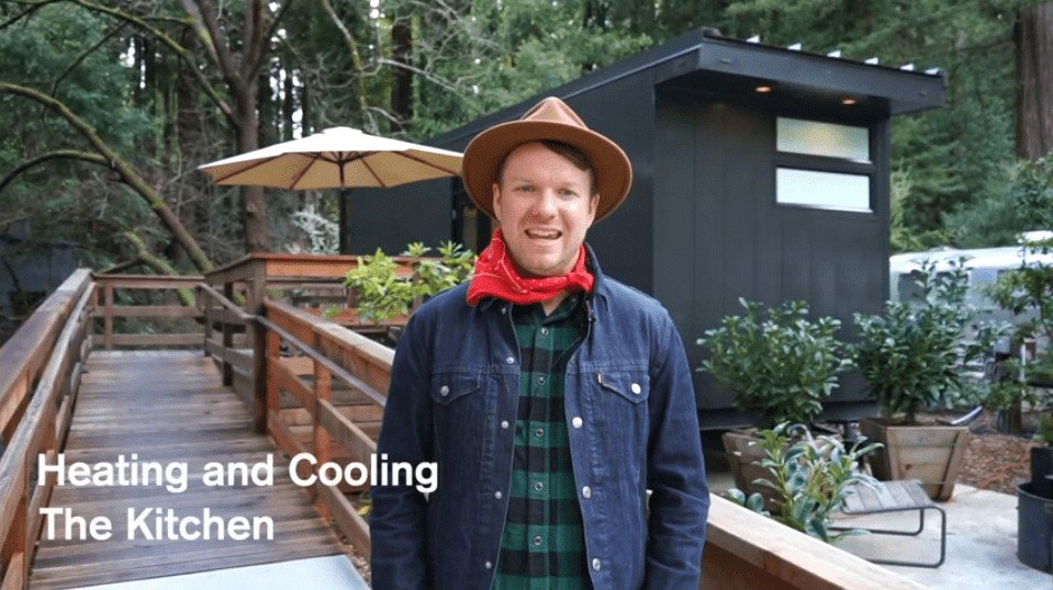 Person in front of cabin