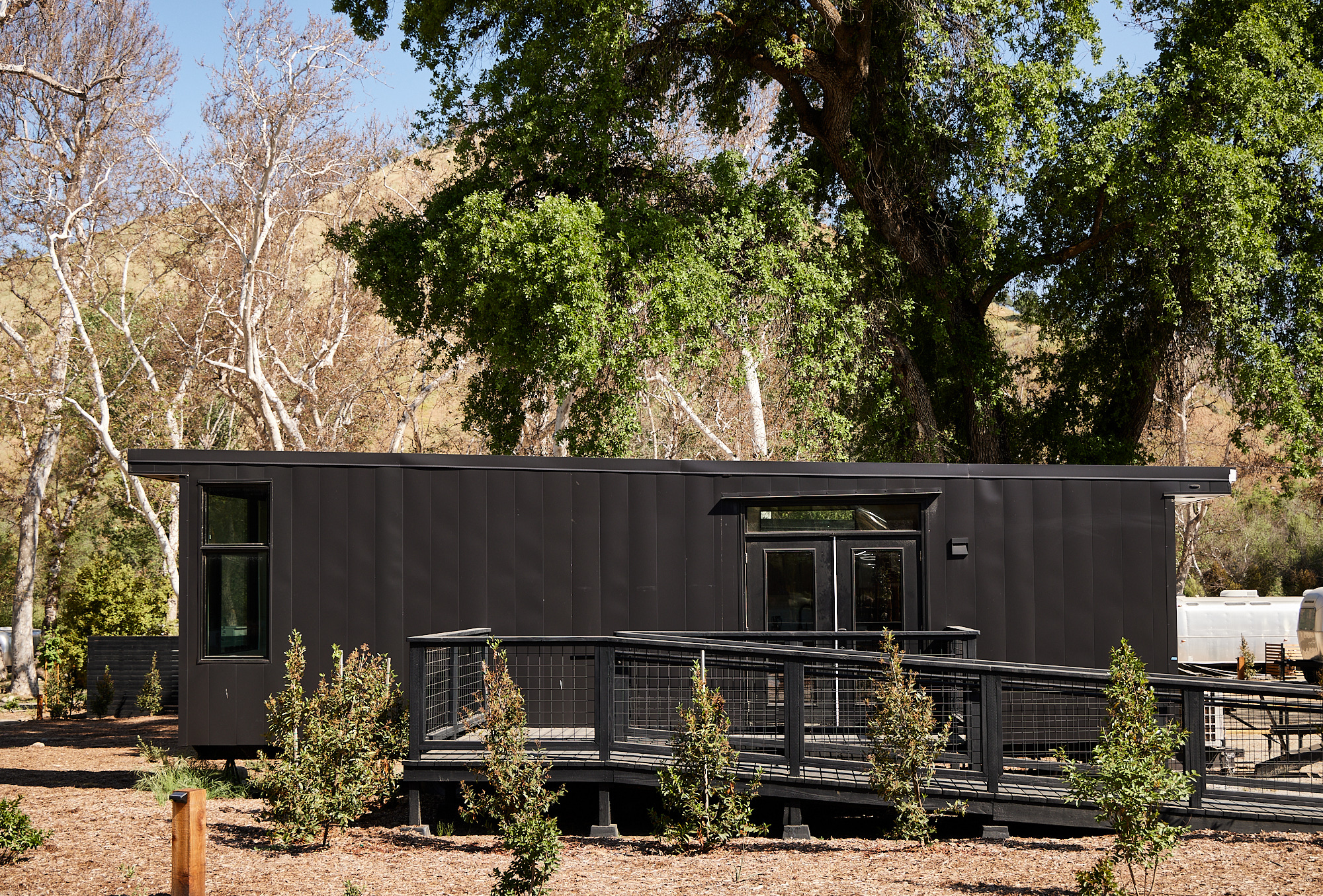 AutoCamp Sequoia accessible suite exterior view featuring ramp entrance