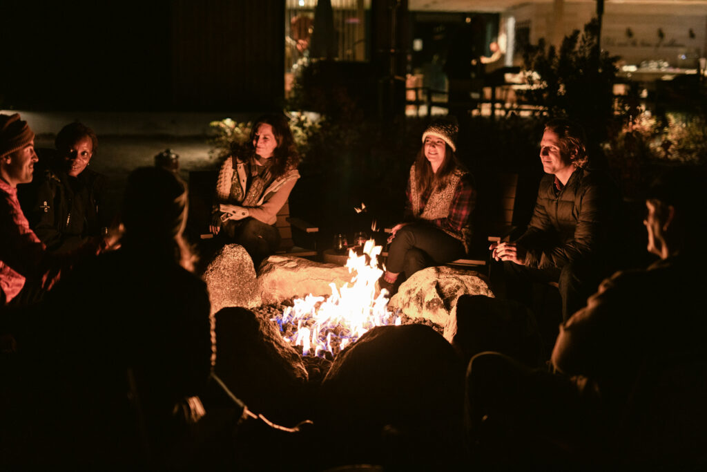 ACCC - People gathered by the fire