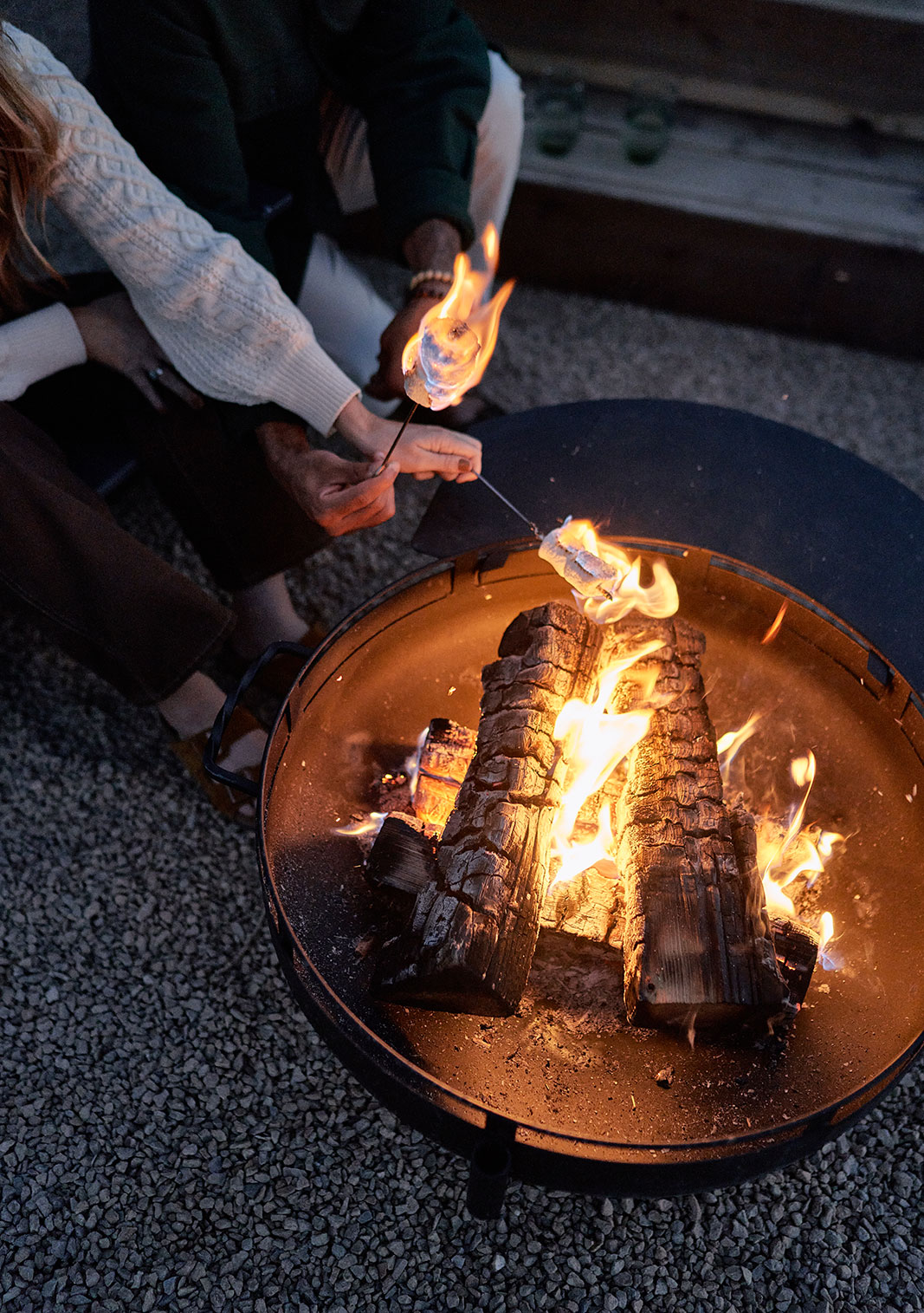 Roasting marshmallows on a firepit