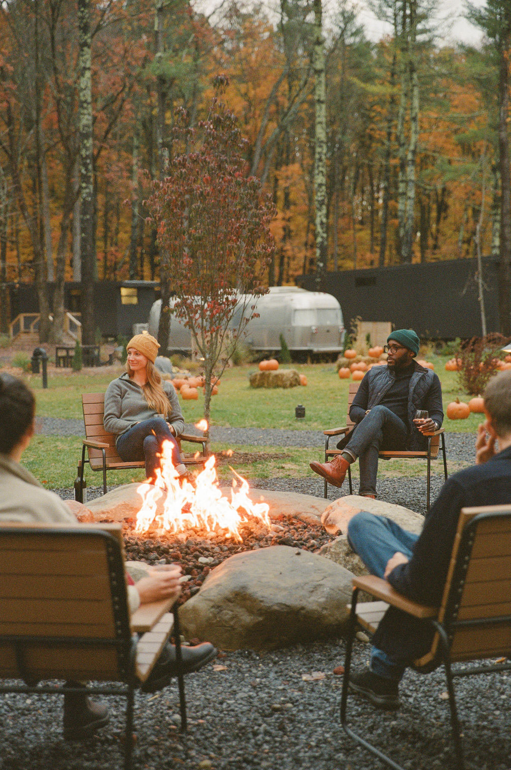 Friends around a campfire in the Catskills