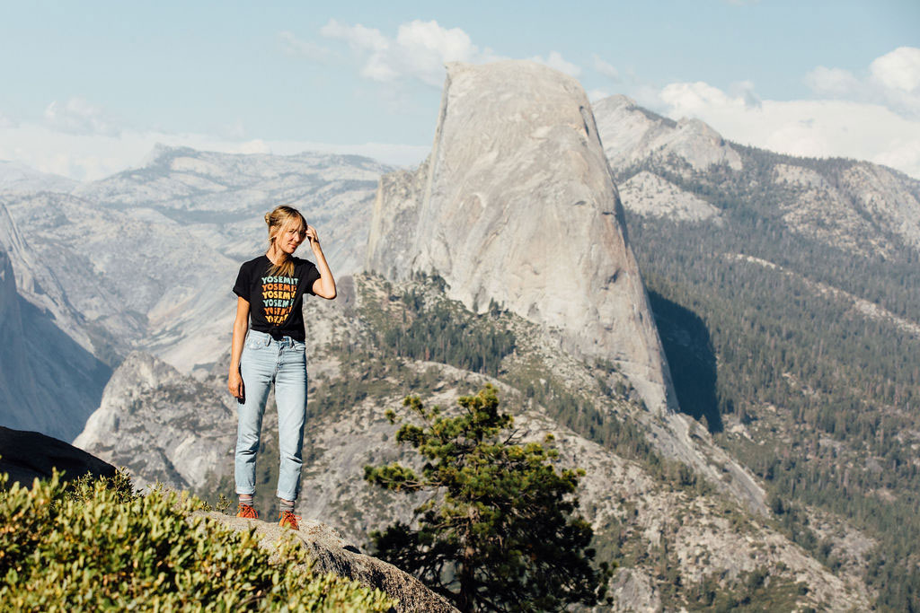 Woman hiking high in Yosemite park