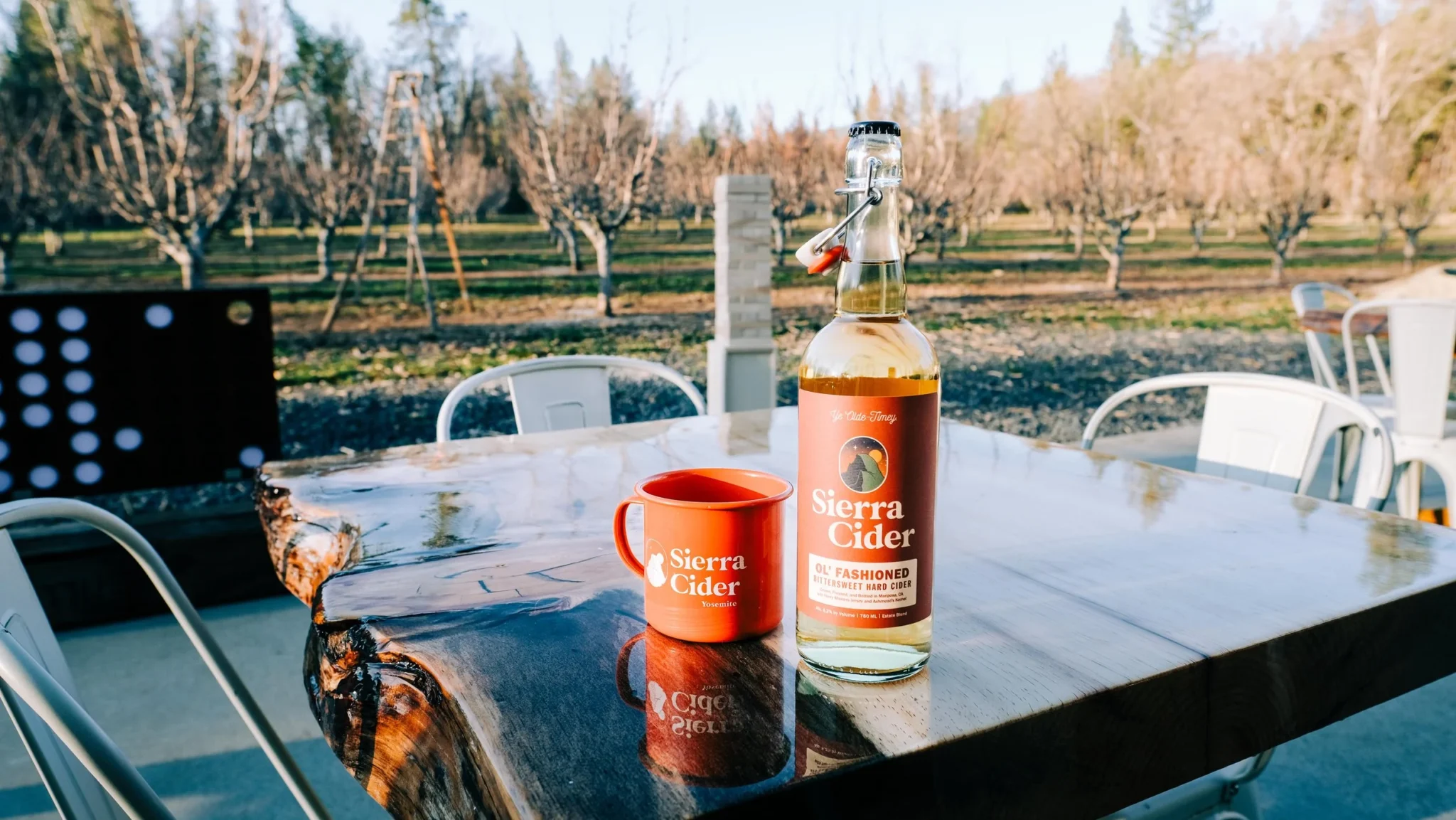 Sierra Cider tasting room view with bottle and cup