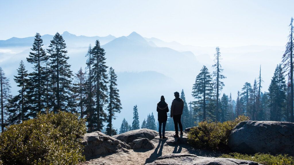 Couple looking over Yosemite views