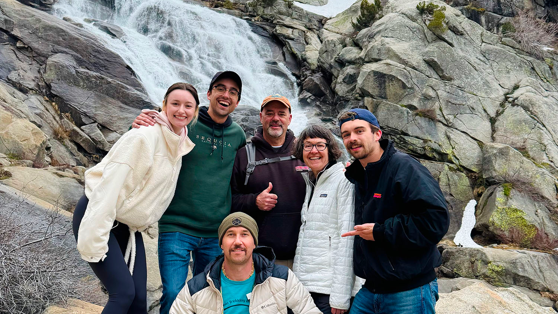 Group gathered by water fall in Three Rivers California