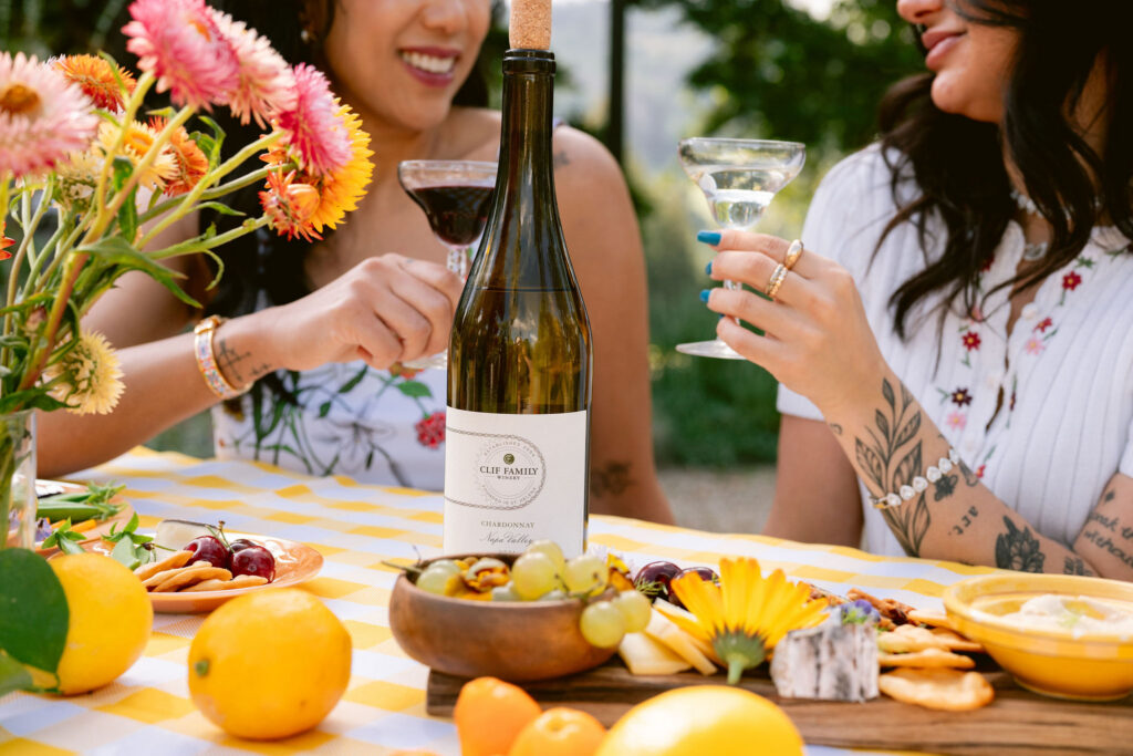 Clif Family Winers bottle on table with snacks and flowers